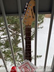 MaxSold Auction: New York Pro Stratocaster-style Red 6-String Electric Guitar - Toronto (Ontario, Canada) SELLER MANAGED Downsizing Online Auction - O'connor Drive (CONDO)