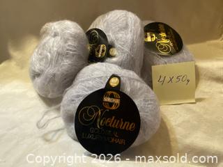 MaxSold Auction: Sirdar Mohair Blend Yarn 50 g Light Grey - 4 Balls - Toronto (Ontario, Canada) SELLER MANAGED Downsizing Online Auction - O'connor Drive (CONDO)