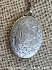 MaxSold Auction: Victorian Sterling Silver Engraved Locket with Chain - Toronto (Ontario, Canada) SELLER MANAGED Downsizing Online Auction - O'connor Drive (CONDO)
