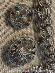 MaxSold Auction: Vintage 60-70s Sterling Silver 8 Charm Bracelet with Multicolor Stones - Toronto (Ontario, Canada) SELLER MANAGED Downsizing Online Auction - O'connor Drive (CONDO)
