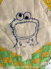 MaxSold Auction: Vintage Hand-Stitched Cotton Patchwork Quilt with Sesame Street Embroidery - 40x58 - Toronto (Ontario, Canada) SELLER MANAGED Downsizing Online Auction - O'connor Drive (CONDO)