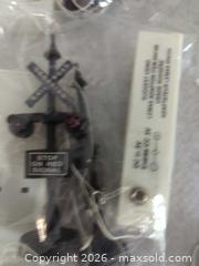 MaxSold Auction: Lemax Winter Village Railroad Crossing Lights & Lamp Posts - Markham (Ontario, Canada) SELLER MANAGED Downsizing Online Auction - Carlton Road