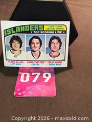 MaxSold Auction: BRYAN TROTTIER  1976-77  ROOKIE  TOP SCORING LINE  Topps  #216  NY Islanders, Collectable  - Aurora (Ontario, Canada) SELLER MANAGED Estate Sale Online Auction - Closs Square