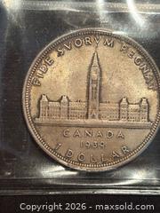 MaxSold Auction: Canada 1939 $1 One Silver Dollar ICCS Certified MS-63 Parliment Royal Visit - Aurora (Ontario, Canada) SELLER MANAGED Estate Sale Online Auction - Closs Square
