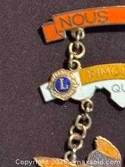 MaxSold Auction: Vintage Lions Club International Rimouski Quebec Lapel Pin Canada Hanging Bird - Aurora (Ontario, Canada) SELLER MANAGED Estate Sale Online Auction - Closs Square
