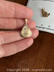 MaxSold Auction: Gold Pendants  - Kingston (Ontario, Canada) PARTNER MANAGED Downsizing Online Auction - Old Quarry Road