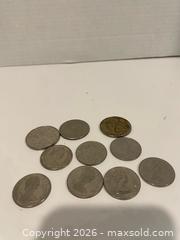 MaxSold Auction: Lot of 10 Canadian Coins (50c and 1$) - Wilmot (Ontario, Canada) PARTNER MANAGED Estate Sale Online Auction - Summit Crescent