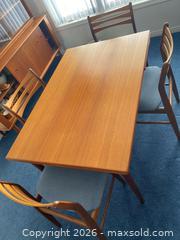 MaxSold Auction: Mid-Century Teak Extendable Dining Table with 6 Chairs - Wilmot (Ontario, Canada) PARTNER MANAGED Estate Sale Online Auction - Summit Crescent