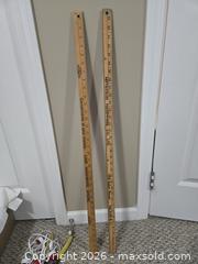 MaxSold Auction: Older yard sticks with advertising - Abbotsford (British Columbia, Canada) SELLER MANAGED Downsizing Online Auction - Auguston Parkway South