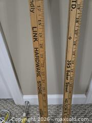 MaxSold Auction: Older yard sticks with advertising - Abbotsford (British Columbia, Canada) SELLER MANAGED Downsizing Online Auction - Auguston Parkway South