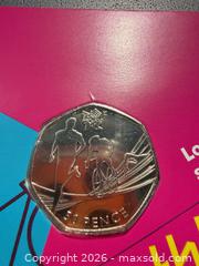 MaxSold Auction: 2011 UK 50p Coin London 2012 Triathlon Commemorative - Orange (Texas, USA) SELLER MANAGED Estate Sale Online Auction - Camelot Street