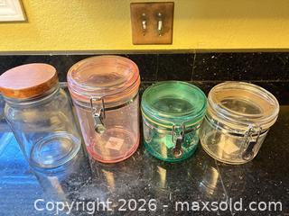 MaxSold Auction: Assorted Storage Jars Lot — Glass, Plastic, Ceramic, Metal, Wood Lids - Orange (Texas, USA) SELLER MANAGED Estate Sale Online Auction - Camelot Street