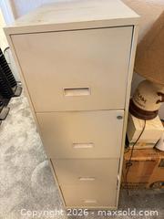 MaxSold Auction: Beige/Tan 4-Drawer Metal Filing Cabinet with Lock - Orange (Texas, USA) SELLER MANAGED Estate Sale Online Auction - Camelot Street
