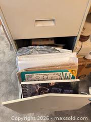 MaxSold Auction: Beige/Tan 4-Drawer Metal Filing Cabinet with Lock - Orange (Texas, USA) SELLER MANAGED Estate Sale Online Auction - Camelot Street