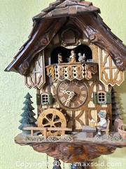 MaxSold Auction: Chalet Black Forest Cuckoo Clock with Music & Animated Figures - Orange (Texas, USA) SELLER MANAGED Estate Sale Online Auction - Camelot Street