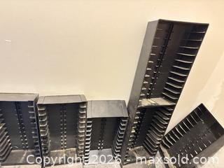 MaxSold Auction: Lot of 3 Black Plastic CD/DVD Media Storage Racks - Orange (Texas, USA) SELLER MANAGED Estate Sale Online Auction - Camelot Street