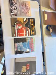 MaxSold Auction: Lot of 4–6 Hardcover History, Photography & Travel Books - Orange (Texas, USA) SELLER MANAGED Estate Sale Online Auction - Camelot Street