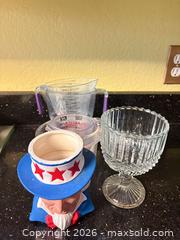 MaxSold Auction: Mixed kitchen & collectible lot: glassware, ceramic Uncle Sam jar - Orange (Texas, USA) SELLER MANAGED Estate Sale Online Auction - Camelot Street