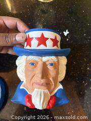 MaxSold Auction: Mixed kitchen & collectible lot: glassware, ceramic Uncle Sam jar - Orange (Texas, USA) SELLER MANAGED Estate Sale Online Auction - Camelot Street