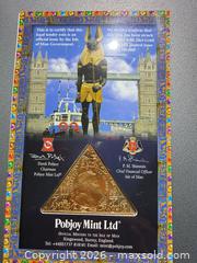 MaxSold Auction: Triangular 24ct Gold Plated Commemorative 1 Crown — Pobjoy Mint - Orange (Texas, USA) SELLER MANAGED Estate Sale Online Auction - Camelot Street