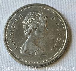 MaxSold Auction: 1975 Canada 1 Dollar Voyageur / Canoe Coin - New Westminster (British Columbia, Canada) SELLER MANAGED Reseller Online Auction - Canfor Avenue