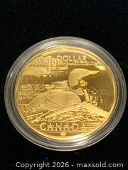 MaxSold Auction: 2004 Canada $1 Loon Collectible Coin & Stamp Set with Box - Contains Very Rare Canada $1 One Dollar Coin ELUSIVE LOONIE, 2004 (1/25,111) - New Westminster (British Columbia, Canada) SELLER MANAGED Reseller Online Auction - Canfor Avenue