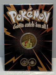 MaxSold Auction: Pokémon GO Pikachu 1996 Gold-Colored Collectible Coin - New Westminster (British Columbia, Canada) SELLER MANAGED Reseller Online Auction - Canfor Avenue