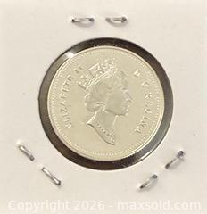 MaxSold Auction: 2003 Cdn. Silver Proof Queen Elizabeth II 50 Cents   - Newmarket (Ontario, Canada) PARTNER MANAGED Reseller Online Auction - Walter Avenue