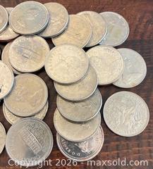 MaxSold Auction: 30 Assort Canadian 1970's to 80's Dollars  - Newmarket (Ontario, Canada) PARTNER MANAGED Reseller Online Auction - Walter Avenue