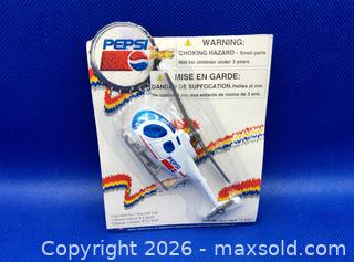 MaxSold Auction: 1990s Golden Wheel Series PEPSI COLA Diecast Motorcycle & Helicopter - Kingston (Ontario, Canada) SELLER MANAGED Downsizing Online Auction - Heron Court.