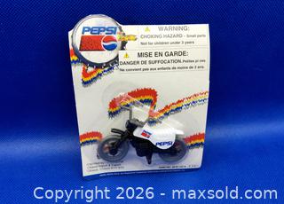MaxSold Auction: 1990s Golden Wheel Series PEPSI COLA Diecast Motorcycle & Helicopter - Kingston (Ontario, Canada) SELLER MANAGED Downsizing Online Auction - Heron Court.