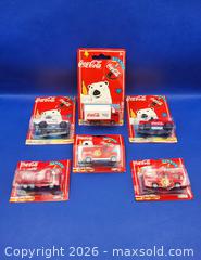 MaxSold Auction: 1996 Collectible Lot of COCA COLA / COKE Majorette Diecast Vehicles  - Kingston (Ontario, Canada) SELLER MANAGED Downsizing Online Auction - Heron Court.