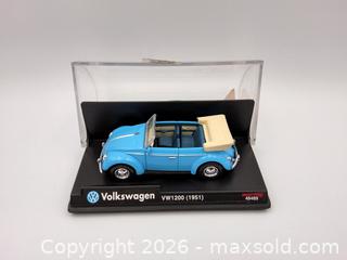MaxSold Auction: 1997 New Ray 1951 VOLKSWAGEN VW1200 Diecast Car 1:43 Scale - Kingston (Ontario, Canada) SELLER MANAGED Downsizing Online Auction - Heron Court.