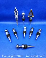 MaxSold Auction: Lot of 9 Decorative Metal WINE BOTTLE STOPPERS - Kingston (Ontario, Canada) SELLER MANAGED Downsizing Online Auction - Heron Court.