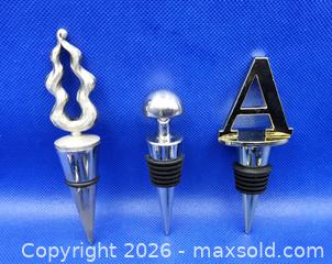 MaxSold Auction: Lot of 9 Decorative Metal WINE BOTTLE STOPPERS - Kingston (Ontario, Canada) SELLER MANAGED Downsizing Online Auction - Heron Court.