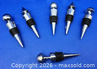 MaxSold Auction: Lot of 9 Decorative Metal WINE BOTTLE STOPPERS - Kingston (Ontario, Canada) SELLER MANAGED Downsizing Online Auction - Heron Court.