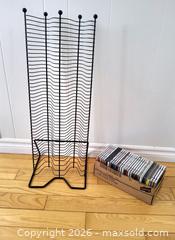 MaxSold Auction: Metal CD Rack Stand & Assorted Music CDs - Kingston (Ontario, Canada) SELLER MANAGED Downsizing Online Auction - Heron Court.