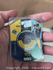 MaxSold Auction: 1/2 DvD playing Football Cards high grade in holder - Kingston (Ontario, Canada) SELLER MANAGED Reseller Online Auction - Railway Street