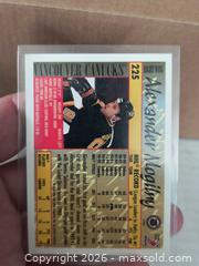MaxSold Auction: Alexander Mogilny Hockey card Mint  - Kingston (Ontario, Canada) SELLER MANAGED Reseller Online Auction - Railway Street