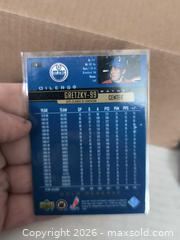 MaxSold Auction: Wayne Grezky Gold Upper Deck Hockey Card - Kingston (Ontario, Canada) SELLER MANAGED Reseller Online Auction - Railway Street