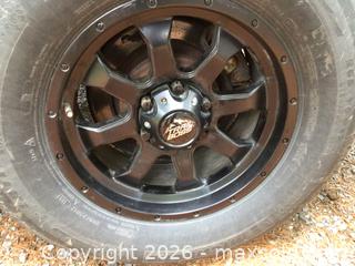MaxSold Auction: Set of four black alloy rims with tires - Kingston (Ontario, Canada) SELLER MANAGED Moving Online Auction - Brewers Mills Road