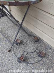 MaxSold Auction: Rustic Outdoor Patio Table with Mosaic Tile Top and Metal Frame - Saanich (British Columbia, Canada) PARTNER MANAGED Moving Online Auction - Limerick Lane