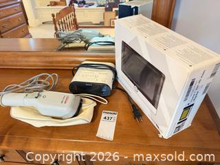 MaxSold Auction: Sunbeam Handheld Steamer, Sony Clock Radio & Boxed Visolux HD Magnifier for vision Impaired  - Saanich (British Columbia, Canada) PARTNER MANAGED Moving Online Auction - Limerick Lane