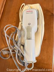 MaxSold Auction: Sunbeam Handheld Steamer, Sony Clock Radio & Boxed Visolux HD Magnifier for vision Impaired  - Saanich (British Columbia, Canada) PARTNER MANAGED Moving Online Auction - Limerick Lane