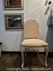 MaxSold Auction: French Farmhouse Accent Chair with Cane Back and Beige Upholstery, Needs Cleaning - Toronto (Ontario, Canada) PARTNER MANAGED Estate Sale Online Auction -Bridle Path Estate