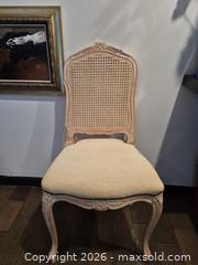 MaxSold Auction: French Farmhouse Accent Chair with Cane Back and Beige Upholstery, Needs Cleaning - Toronto (Ontario, Canada) PARTNER MANAGED Estate Sale Online Auction -Bridle Path Estate