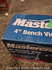MaxSold Auction: Mastercraft 4" Cast Iron Bench Vise with Swivel Base Lot 1 of 2 - Toronto (Ontario, Canada) PARTNER MANAGED Estate Sale Online Auction -Bridle Path Estate