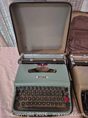 MaxSold Auction: Vintage Olivetti Lettera 22 Portable Typewriters, Lot of 2 - Toronto (Ontario, Canada) PARTNER MANAGED Estate Sale Online Auction -Bridle Path Estate