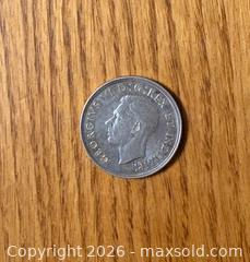 MaxSold Auction: 1939 Canada $1 silver dollar coin  - Kingston (Ontario, Canada) SELLER MANAGED Downsizing Online Auction -  Juniper Drive