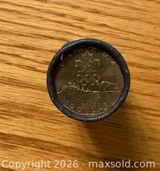 MaxSold Auction: Sealed Roll of Olympic Lucky Loonie coins from the Mint  - Kingston (Ontario, Canada) SELLER MANAGED Downsizing Online Auction -  Juniper Drive